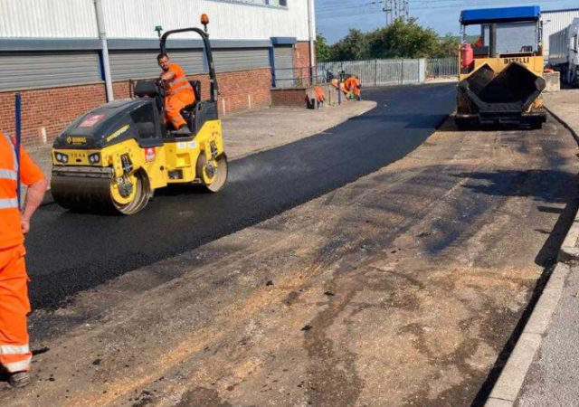 Laying Fresh Tarmac On A Road