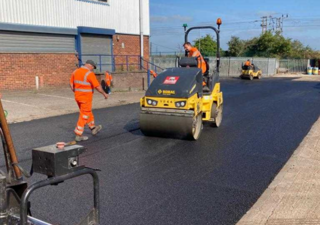 Road Roller Compacting Fresh Tarmac